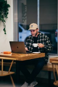 Man working and looking content showing good employee experience 