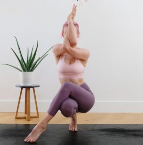 flexible woman doing yoga